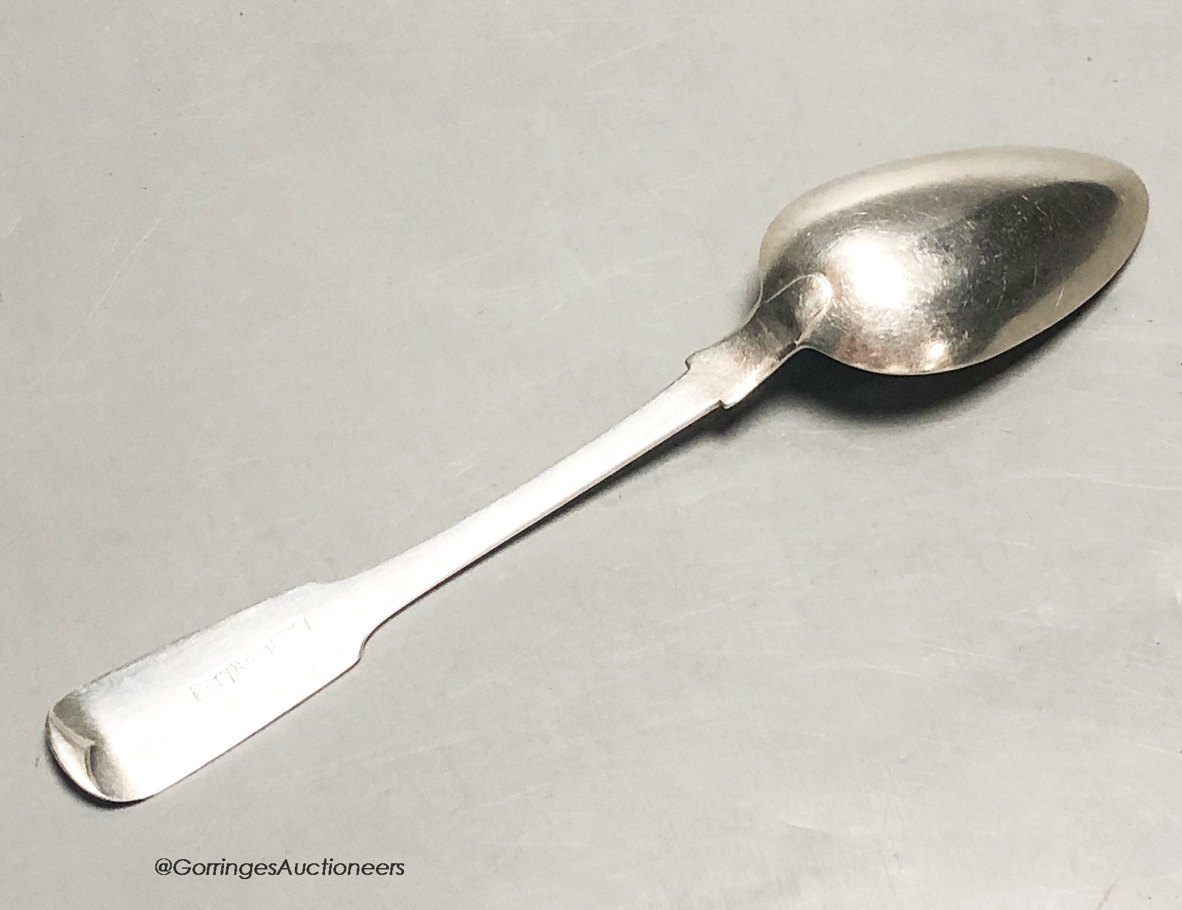 An early 19th century Scottish provincial silver fiddle pattern dessert spoon, by John & Patrick Riach, Forres, c.1825, 17.4cm, 34 grams.